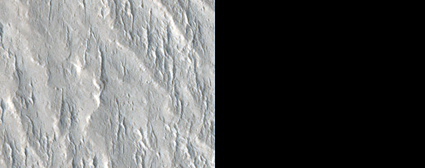 Contact between Medusae Fossae and Northern Flank of Apollinaris Mons