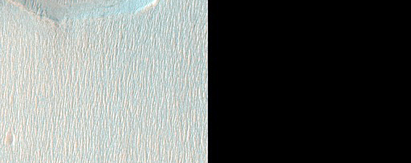 Smooth Pitted Materials in Terra Sirenum Depression