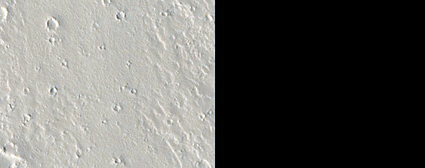 Possible New Impact on Small Volcano Southeast of Olympus Mons