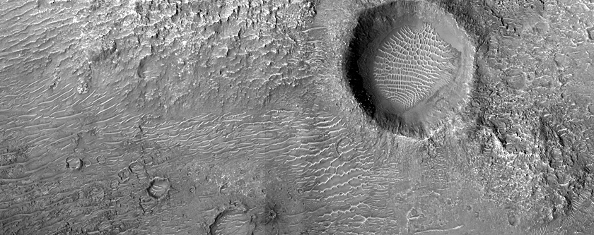 Monitoring Rockfalls in Tyrrhena Terra