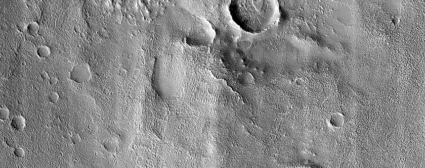 Dipping Layers in Craters in Northern Mid-Latitudes