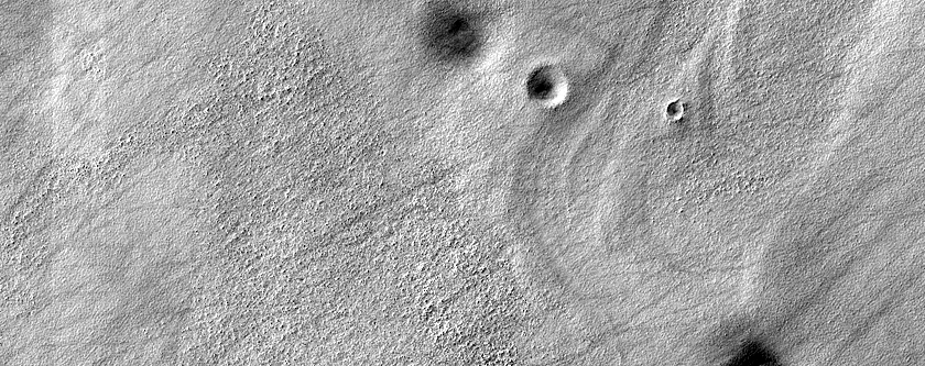 Flow Features on Ice-Rich Plateau on Malea Patera