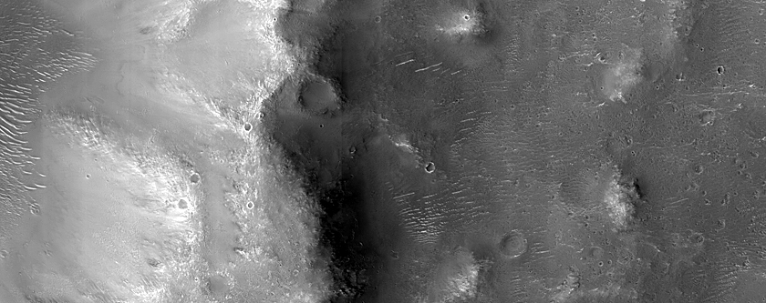 Terra Tyrrhena Crater Rim with Phyllosilicate-Rich Terrain