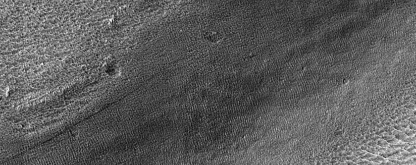 Possible Englacial Layer Outcrop in Euripus Mons