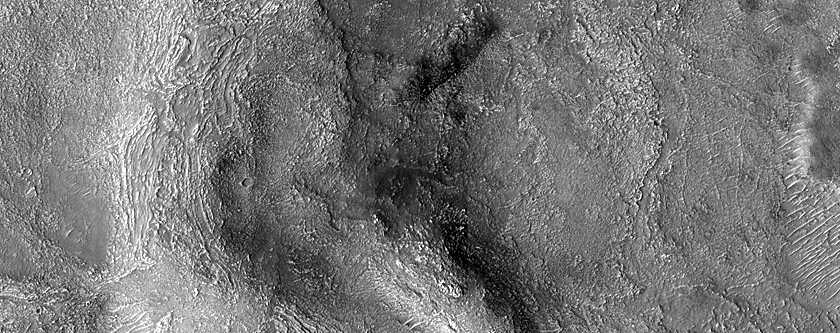 Hydrated Silicon-Rich Terrain in West Hellas Planitia
