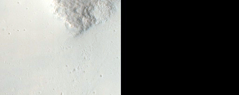Possibly Olivine-Rich Materials around Crater in Tyrrhena Dorsa