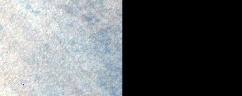 Intracrater Dune Field and Associated Extracrater Dark Streak