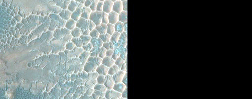 Monitor Slope Features in Central Pit of Elorza Crater