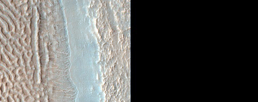 Crater with Floor Filling Material in Noachis Region