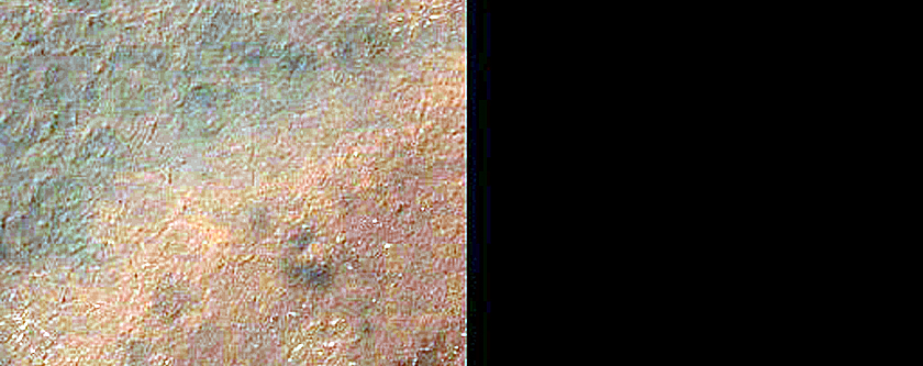 Crater in Chasma Australe
