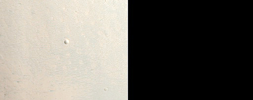 Mafic Minerals Exposed by Crater on Western Syrtis Major Planum