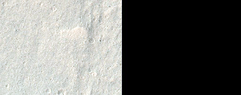 Pit in Mid-Latitude Mantle
