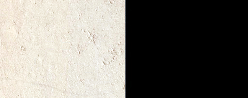 Slope Streaks in Tikhonravov Crater