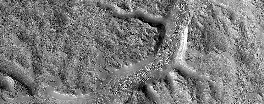 Channel along Crater Ejecta