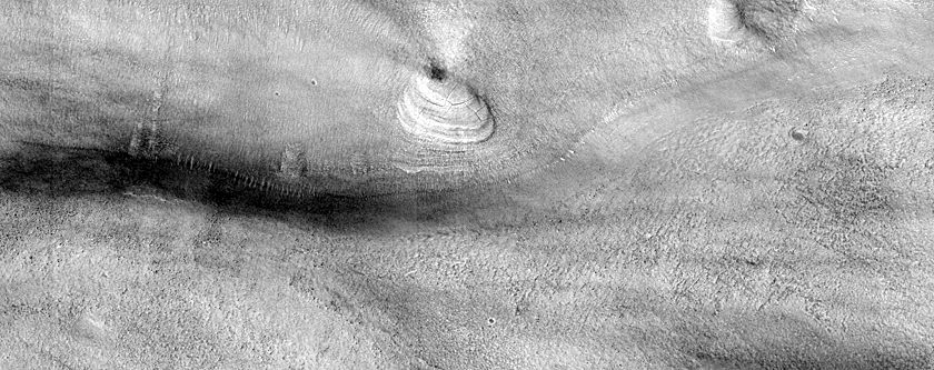 Layered Structures in Hellas Planitia