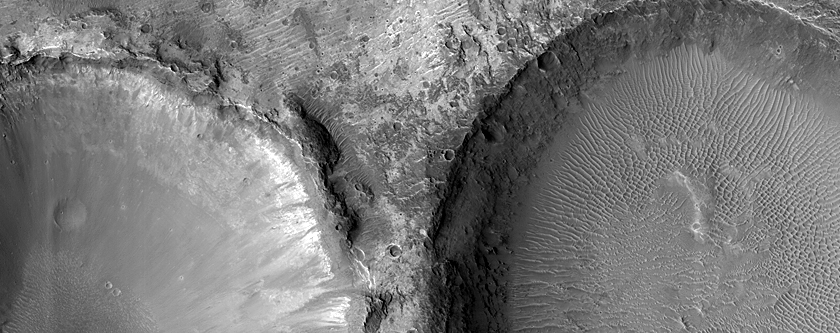 Diverse Materials Exposed by Well-Exposed Crater off Her Desher Vallis