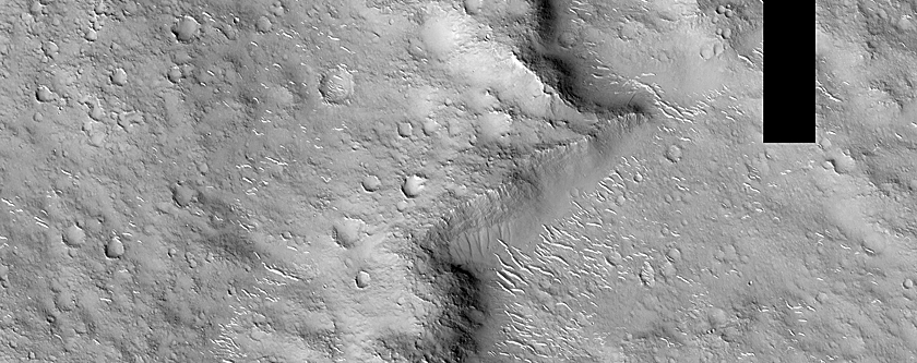 Distal Ramparts of Fresh Impact Crater