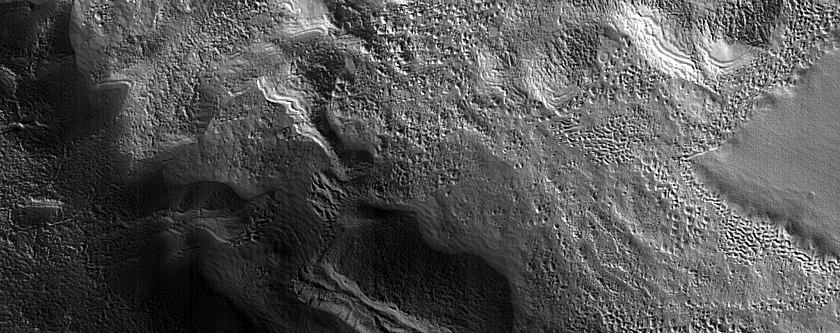 Deposits on Crater Floor in Rudaux Crater