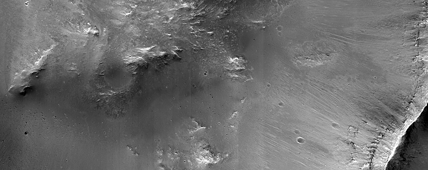 Small Crater in Herschel Crater with Slope Features