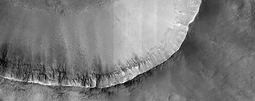 Crater Rim and Ejecta in Ariadnes Colles