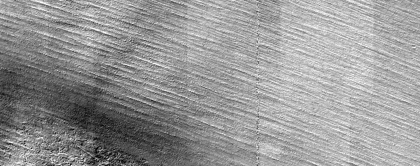 Water-Ice Outlier near South Polar Layered Deposits