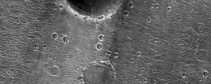 Crater Rim Deposits near Planned ExoMars Landing Site in Oxia Planum 