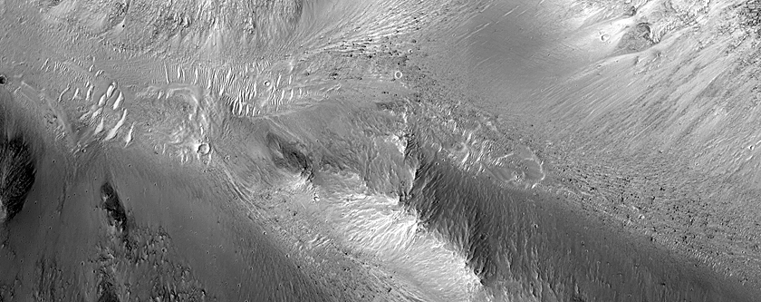 Slope Features on Orson Welles Crater Wall