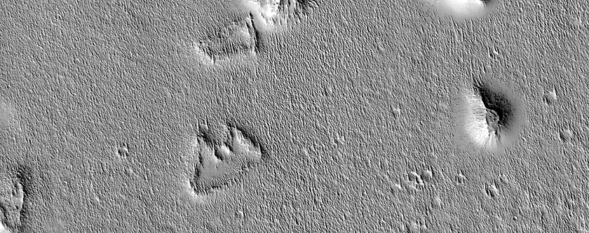 Irregular Rings and Hills