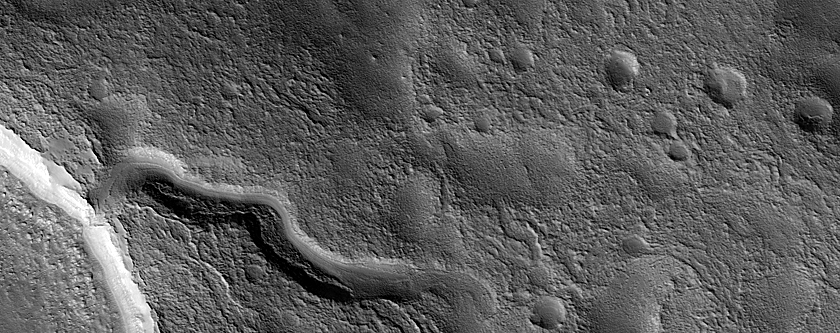 Channel and Crater in Northern Mid-Latitudes