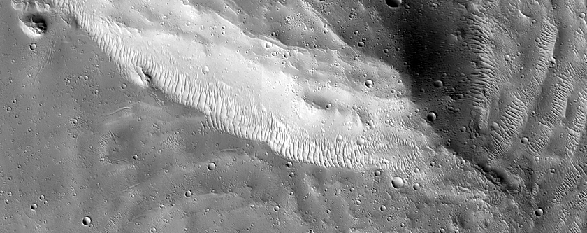 Slumped Material at Edge of Olympus Mons Basal Scarp