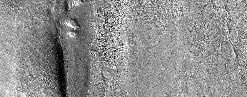 Dipping Layers along Mound in Deuteronilus Mensae