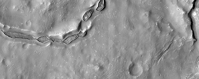 Fresh-Looking Ruptures on Crater Floor in Noachis Terra