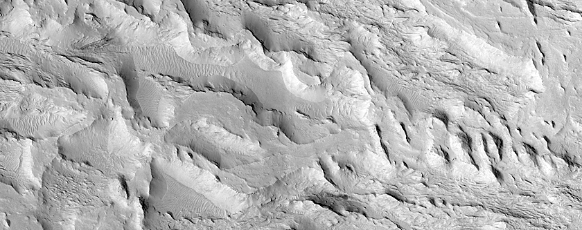 Transition from Fluvial Ridges to Flat-Lying Rock at Aeolis Dorsa