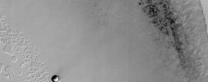 Possible Crater or Pit on South Polar Residual Cap
