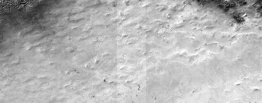 Candidate Recent Impact Site West of Promethei Rupes