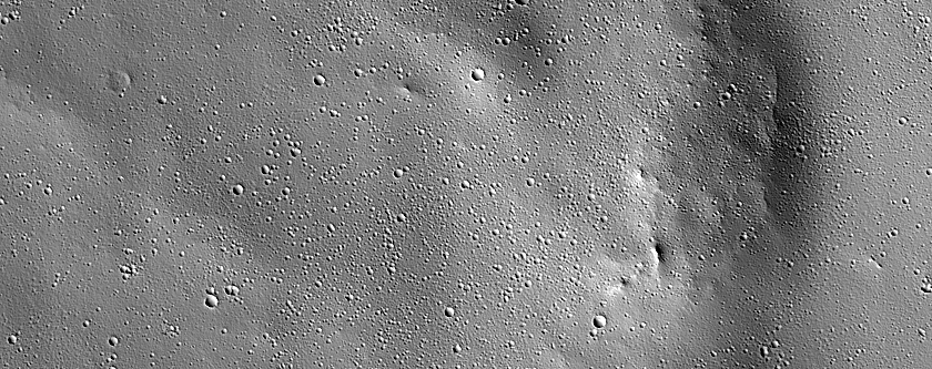 Impact Ejecta from Paros Crater