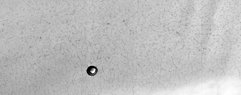 South Polar Residual Cap Possible Impact Crater or Pit