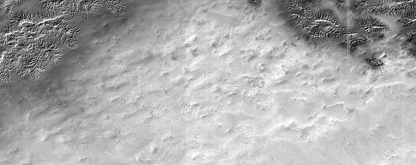 Candidate Recent Impact Site West of Promethei Rupes