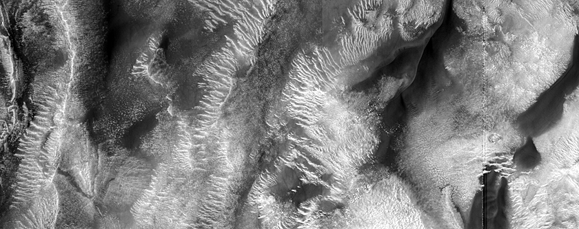 Possible Pyroxene-Rich Materials on Hellas Planitia Floor