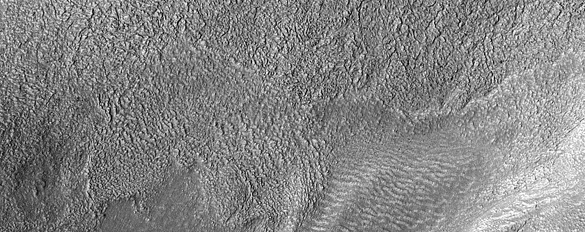 Tongue-Shaped Flow Feature in Promethei Terra