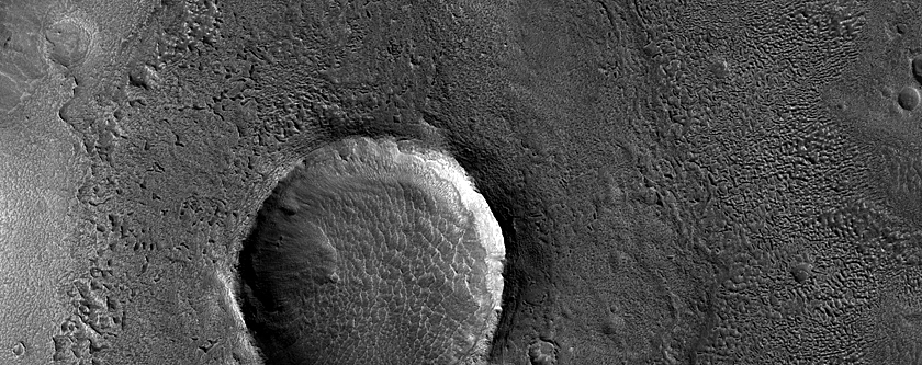 Pits in Crater Ejecta North of Arabia Terra