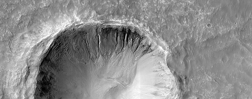 Gullies with Fractured Fans in 2-Kilometer Diameter Crater