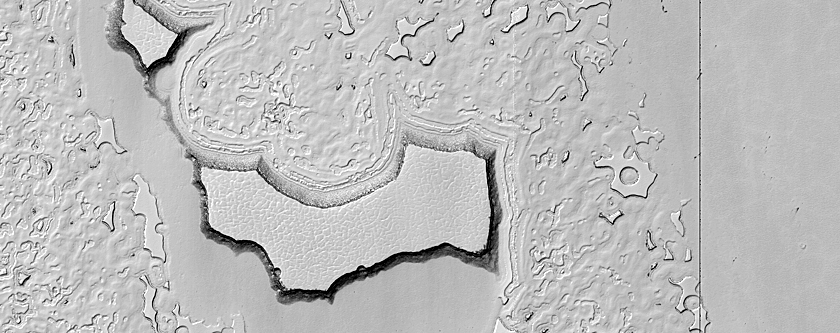 Thick Carbon Dioxide Ice Mesas