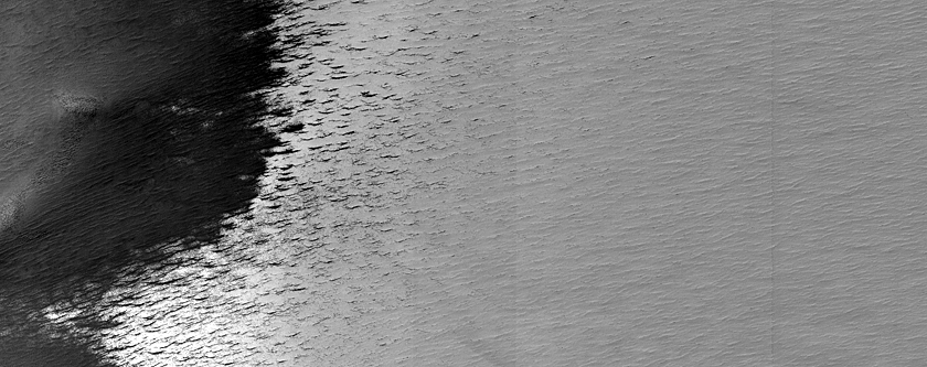 South Polar Residual Cap Possible Impact Crater or Pit