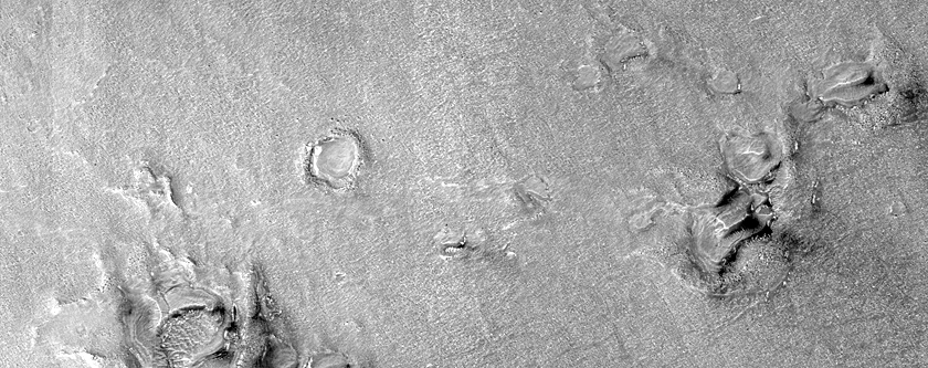 Layers in Craters in Deuteronilus Mensae