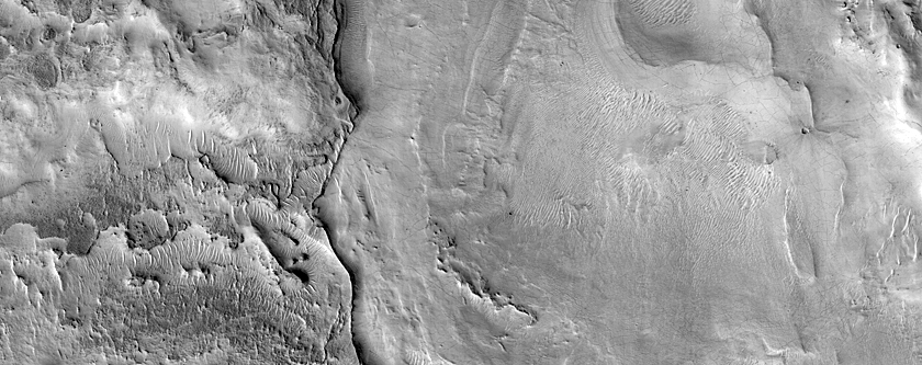 Layers in Crater Depression West of Huo Hsing Vallis