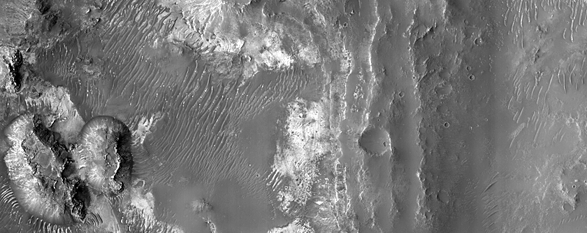 Layered Bedrock and Bedforms in Flaugergues Crater