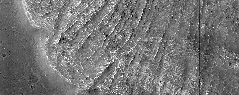 Overlapping Debris Aprons within Ganges Chasma
