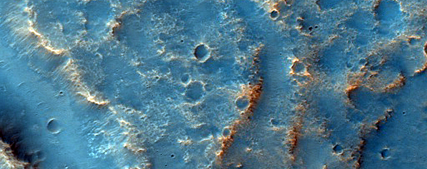 Exit Breaches in Small Low-Latitude Crater