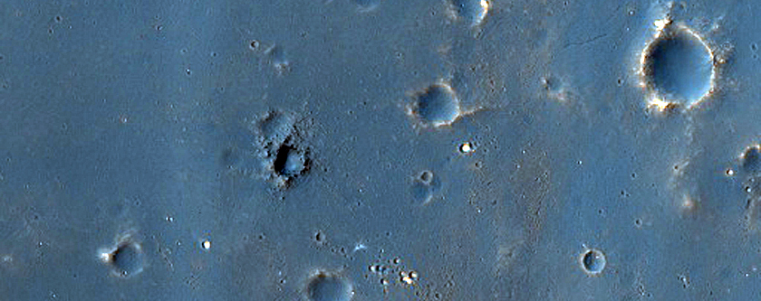 Dark-Rayed Impact Crater near Voeykov Crater